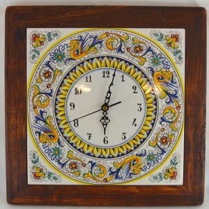 CLOCK &ldquo;RAFFAELLESCO&rdquo; WITH WOODEN FRAME WORM-EATERN FROM CM. 38,5