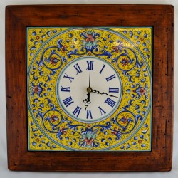 CLOCK “VOLUTE BLU FONDO GIALLO” WITH WOODEN FRAME WORM-EATEN FROM CM. 34