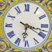 OROLOGIO “VOLUTE BLU FONDO GIALLO” CON CORNICE TARLATA  DA CM. 34