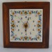 OROLOGIO “VOLUTE FIORI” CON CORNICE TARLATA  DA CM. 28,5